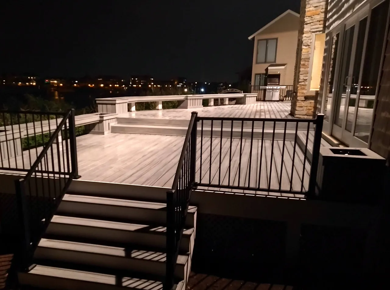 Deck with accent lighting at night, Hampton Roads VA